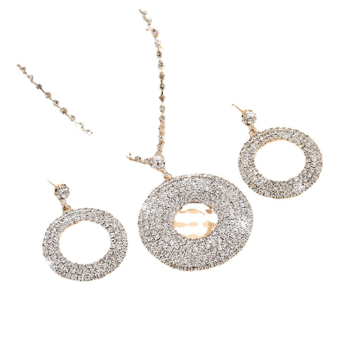 Jewelry set with circular earrings and necklace on a white background